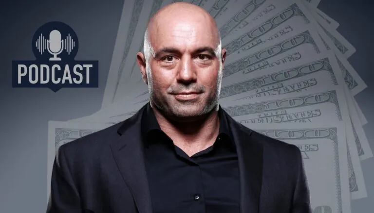 Joe Rogan standing in front of a background featuring dollar bills and a 'Podcast' logo