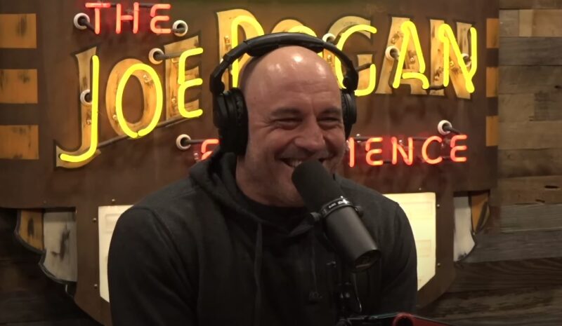 Joe Rogan smiling in his podcast