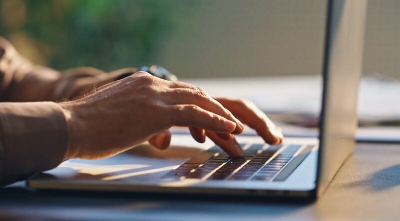 Hands expertly navigating the keyboard