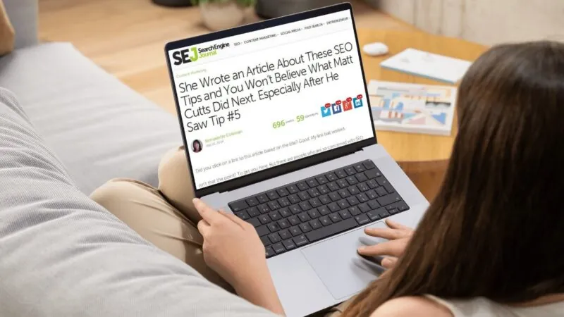 A woman engrossed in a laptop, reviewing an clickbait article