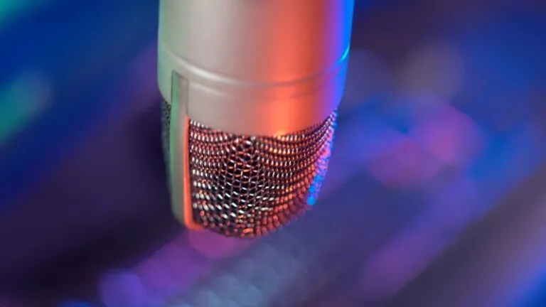 Microphone with colorful lighting and 'Podcasts That Changed Public Opinion on Key Issues'