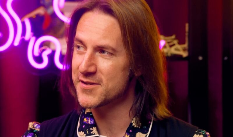 A close-up portrait of Matt Mercer with expressive features and a thoughtful expression