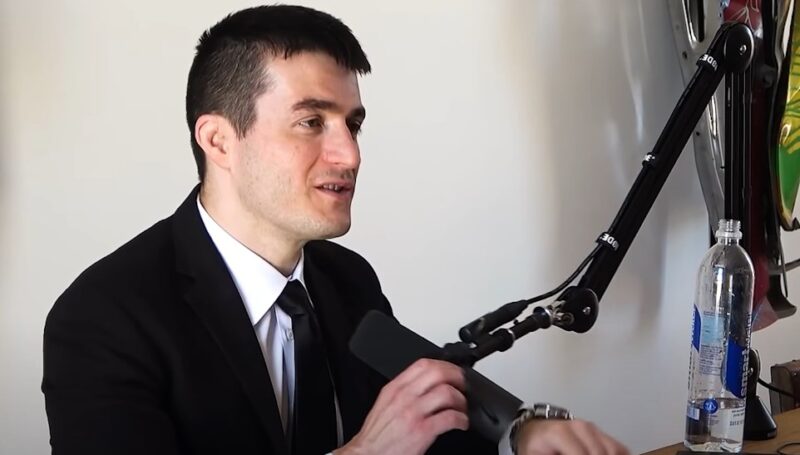 Lex Fridman talking during a podcast