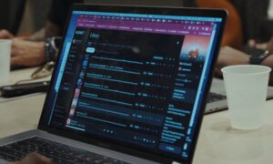 Suno AI tool opened on a laptop