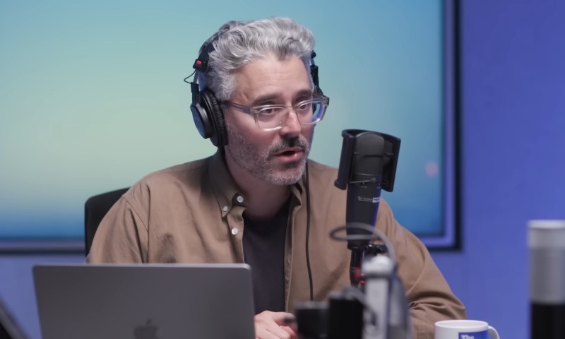 Michael Barbaro speaks in a studio, during "The Daily" podcast
